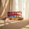 A 24-color portable children's watercolor paint tray with sponge pads details Picture
